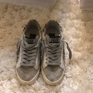 Grey & leopard sued Golden Goose shoes